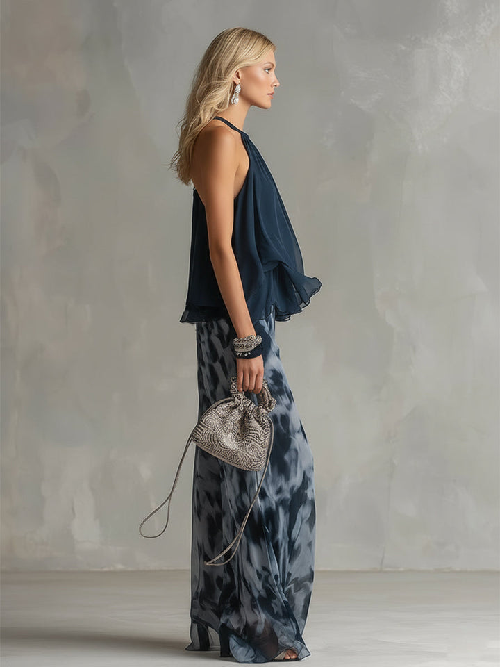 Ludovica - elegante en chiffón con top de cuello alto y pantalones anchos estampados
