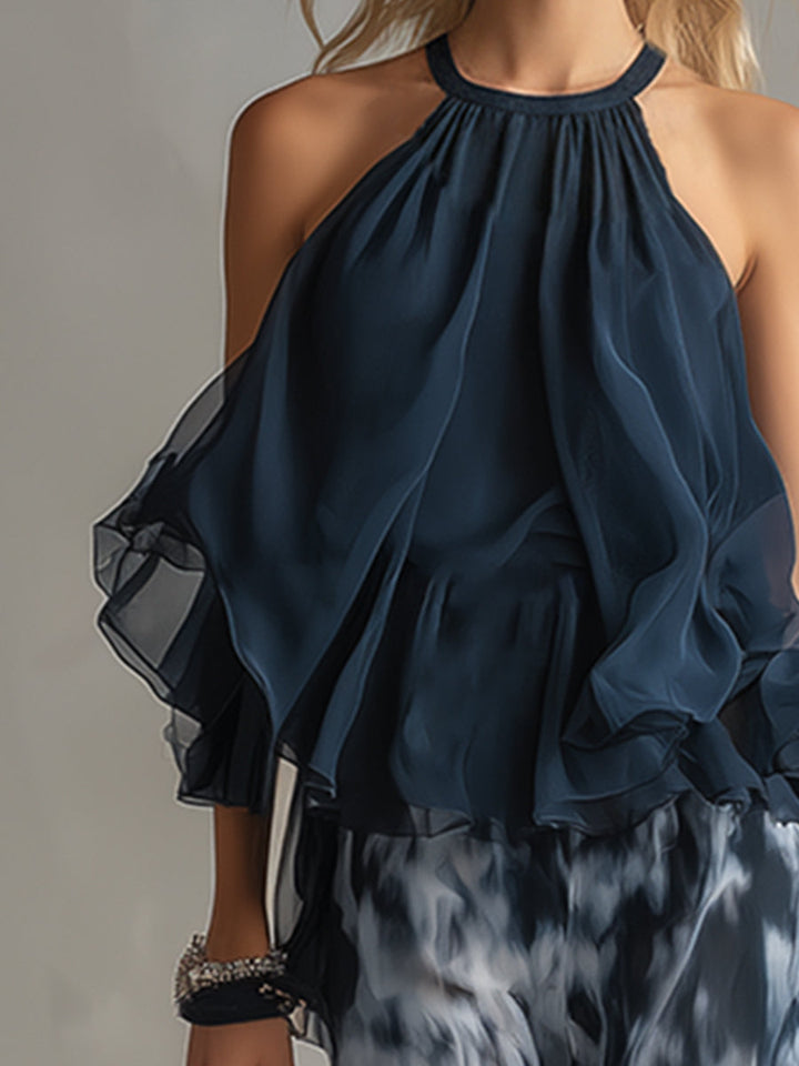Ludovica - elegante en chiffón con top de cuello alto y pantalones anchos estampados