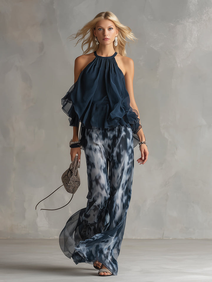 Ludovica - elegante en chiffón con top de cuello alto y pantalones anchos estampados
