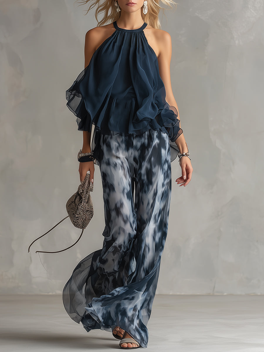 Ludovica - elegante en chiffón con top de cuello alto y pantalones anchos estampados