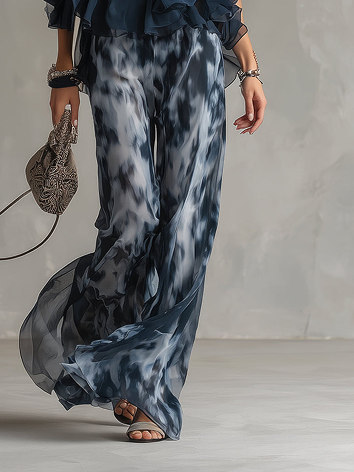 Ludovica - elegante en chiffón con top de cuello alto y pantalones anchos estampados